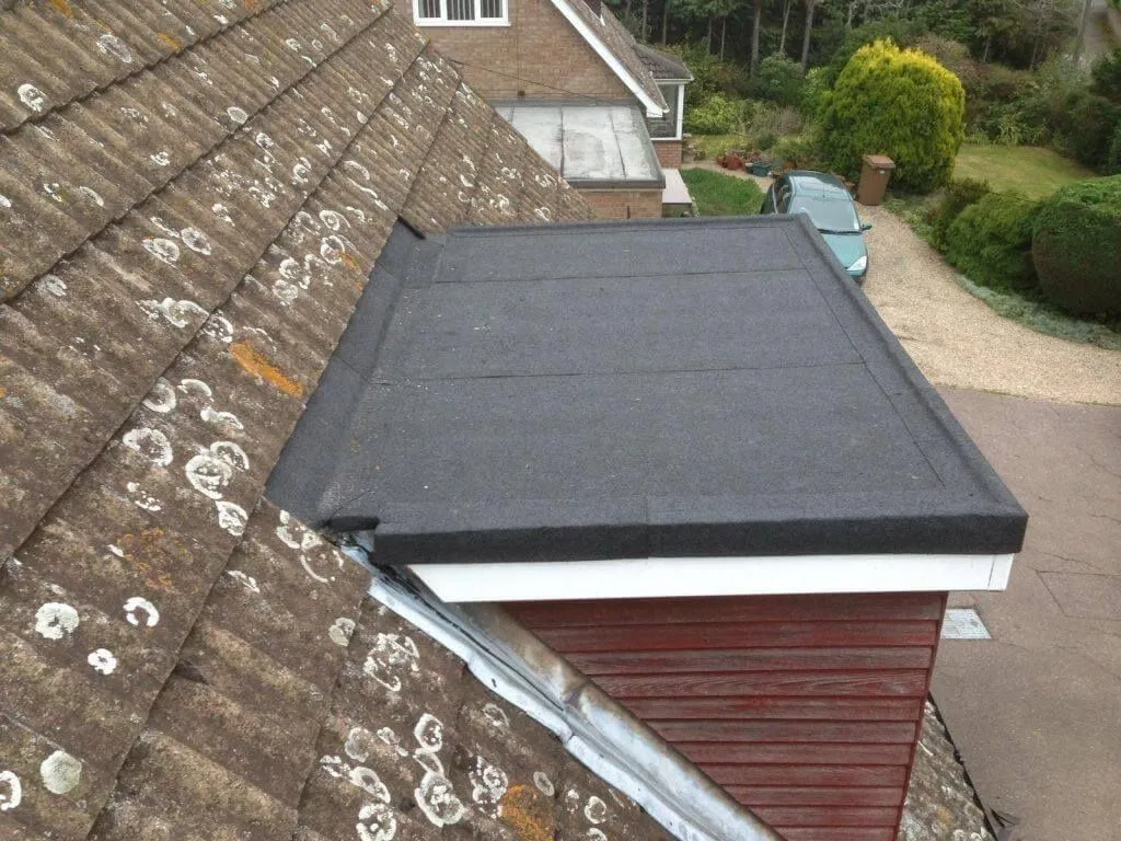 Felt roofers working on a roof in Derby and Derbyshire