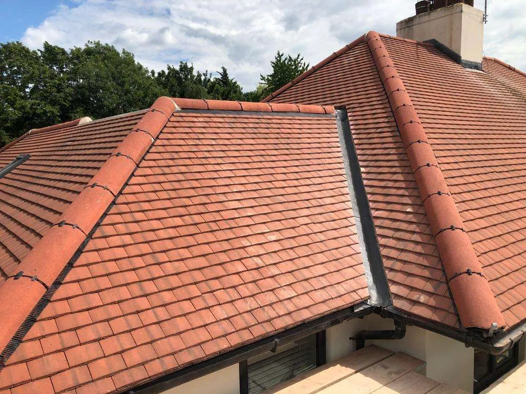new-roof-installation New corrugated bitumen roof sheet installation